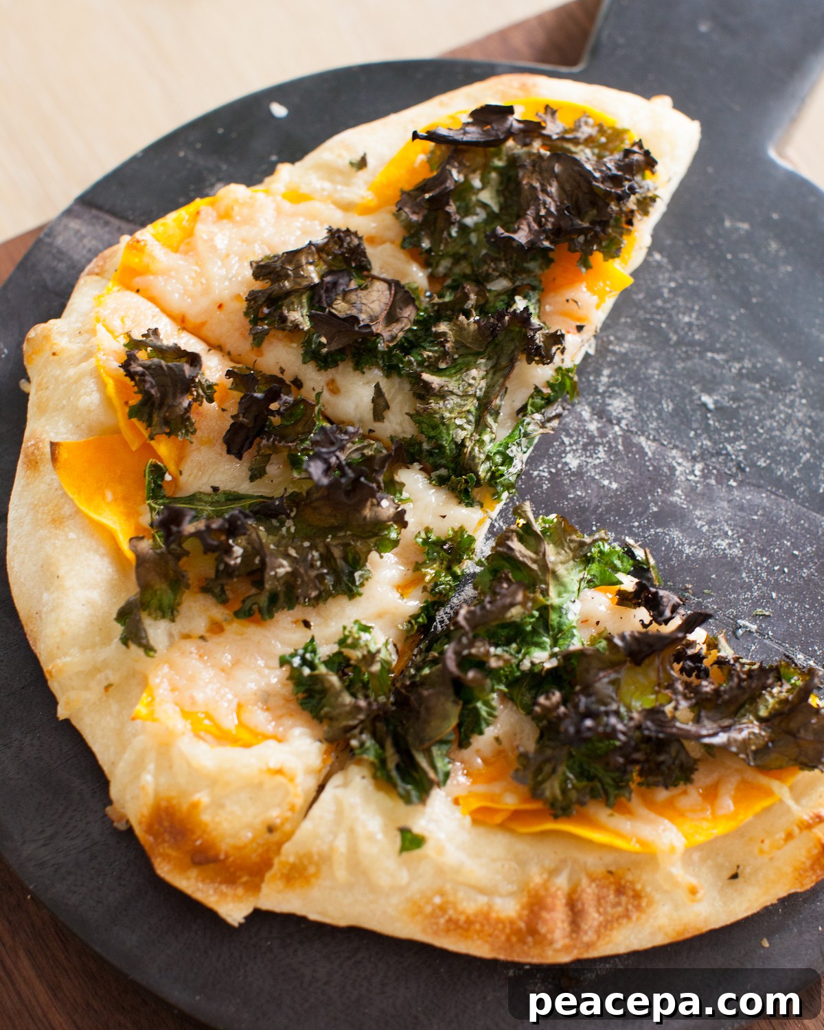 butternut squash sourdough pizza with kale topping