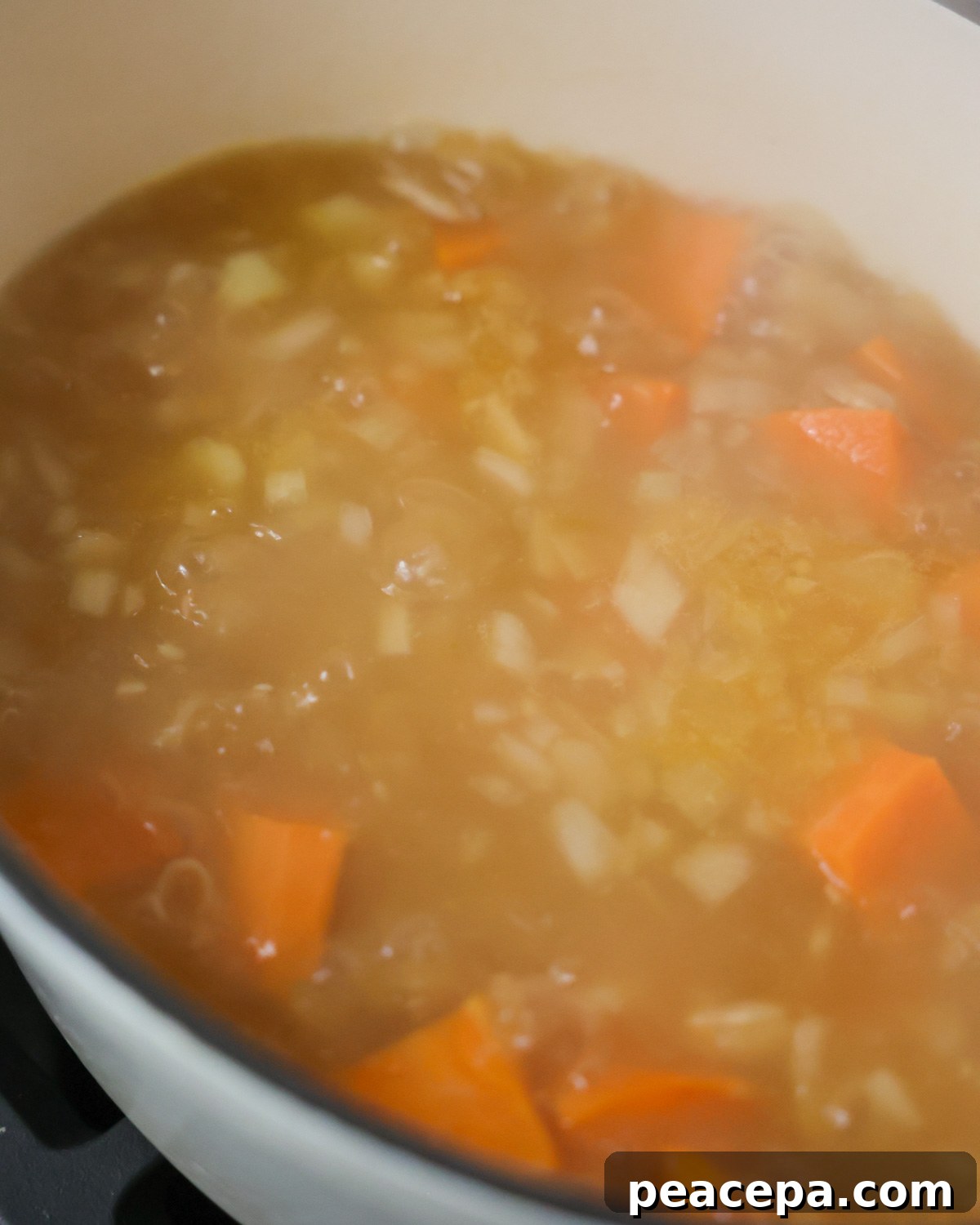 Simmering sweet potato soup.