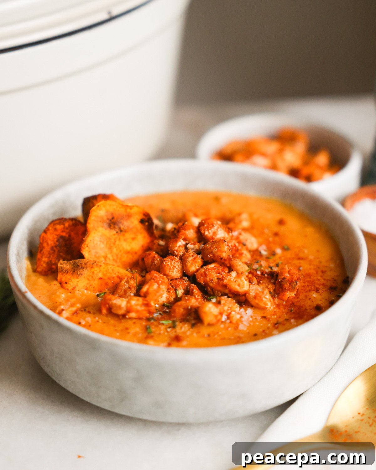 Bowl of vegan sweet potato soup.