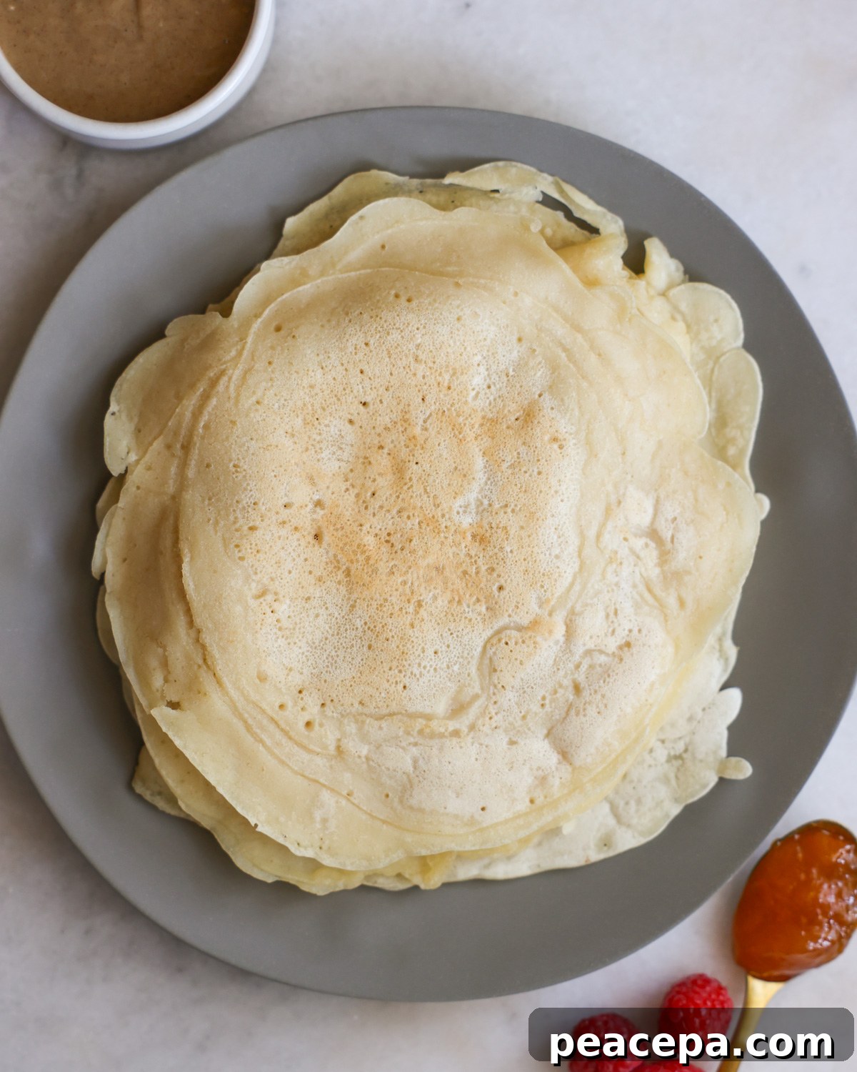 vegan crepes stacked on plate