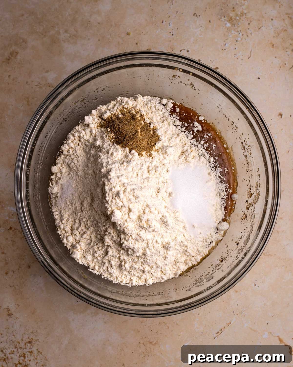 dry ingredients added to wet in a bowl