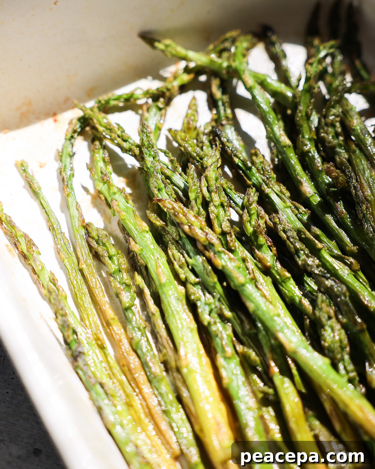 roasted asparagus in baking dish