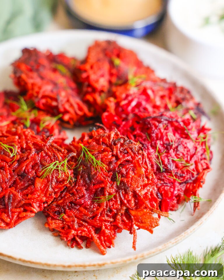 plate of Beet and Sweet Potato Fritters