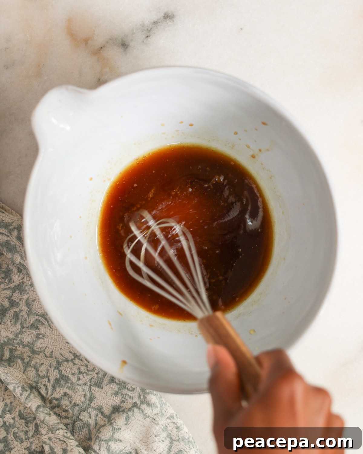 overhead whisking marinade