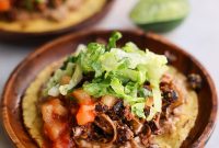 Crispy Vegan Tostadas with Spicy Black Bean & Avocado Topping