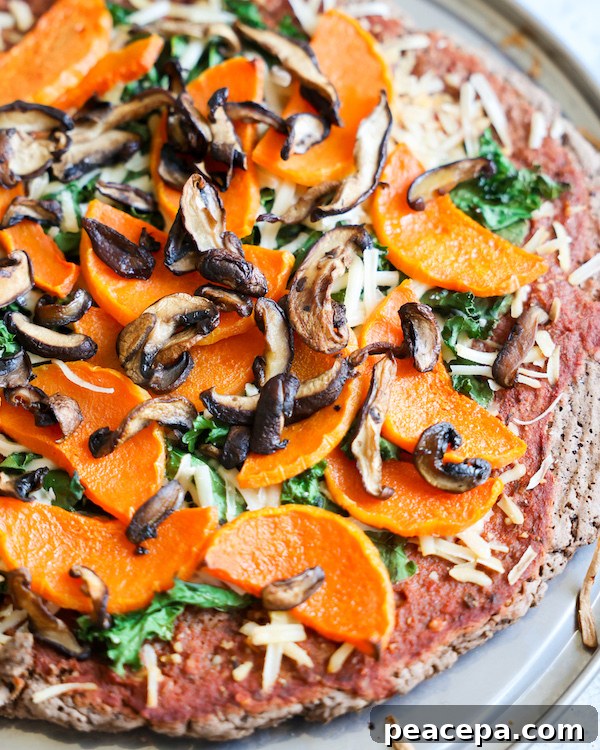 Vegan Black Bean Crust Pizza with toppings.