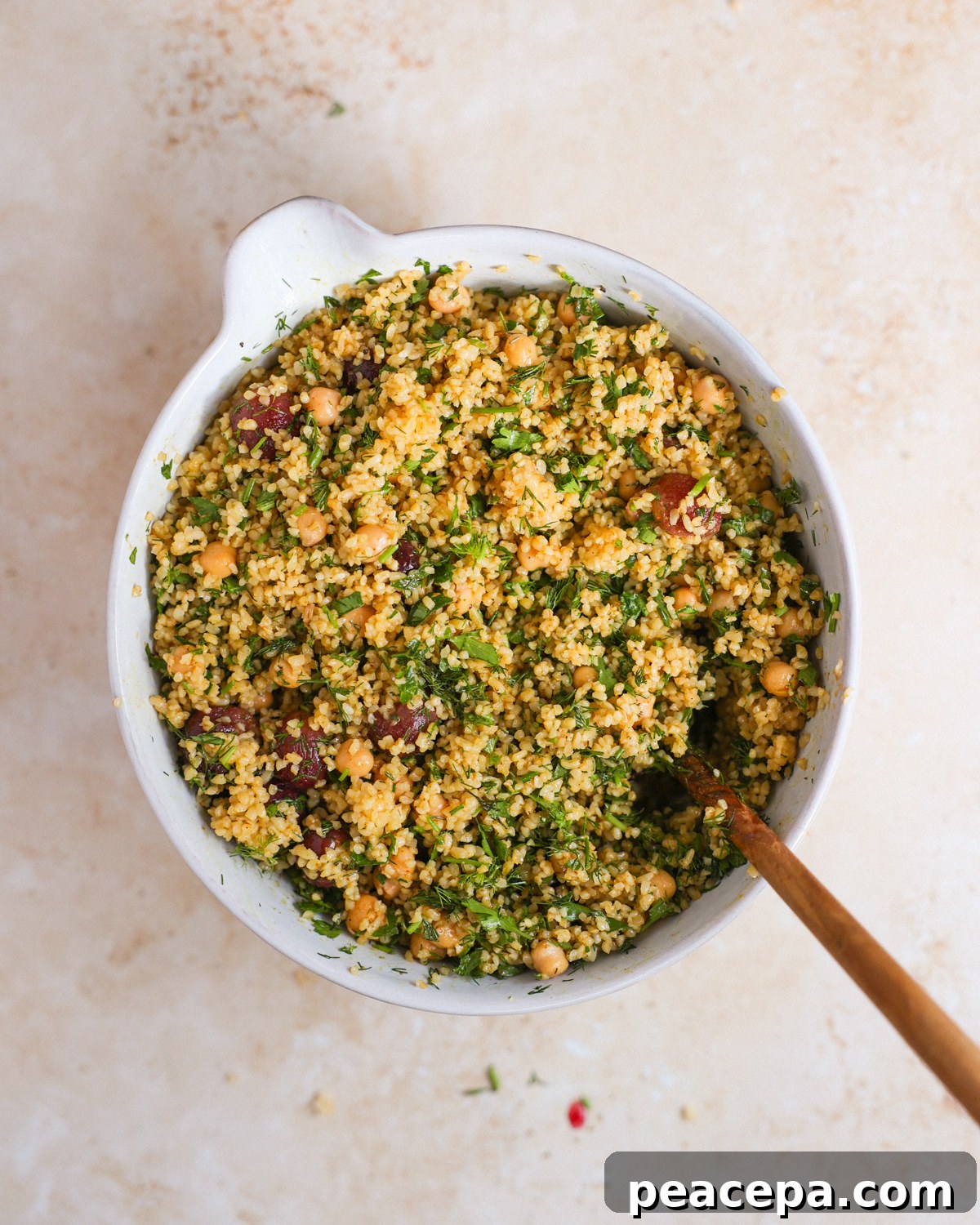 overhead of tossed bulgur salad