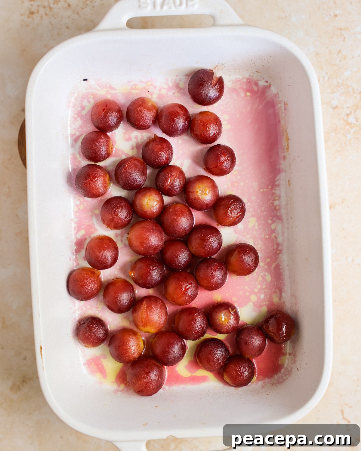 roasted grapes in baking dish overhead