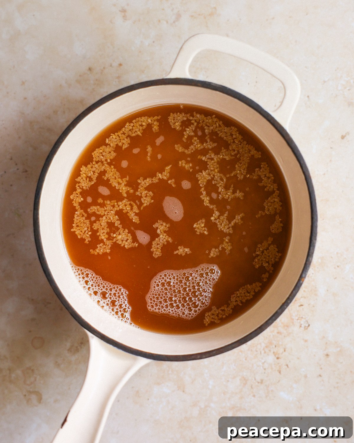 bulgur in pot with broth