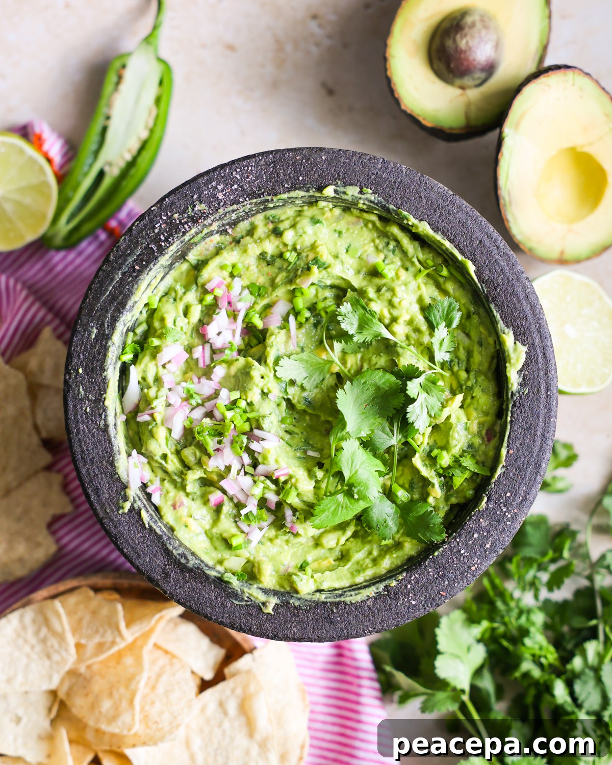 Creamy Homemade Guacamole Recipe for Parties and Dips 2 Easy guacamole recipe in bowl.