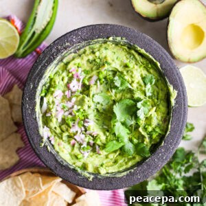 Creamy Homemade Guacamole Recipe for Parties and Dips 15 Easy guacamole recipe in bowl.