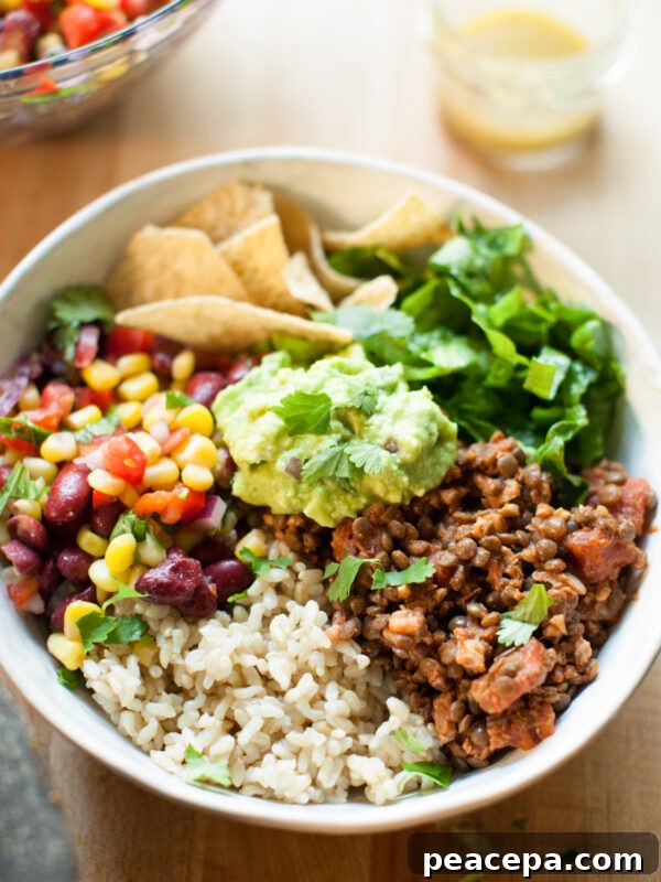 Vegan burrito bowl on table.